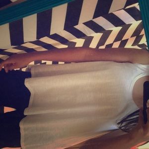 A top that goes over your bathing suit. Never worn